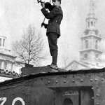 English violinist Albert Sammons plays atop a tank in Trafalgar Square, 1916