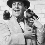 Italian tenor Tito Schipa with his pet monkeys